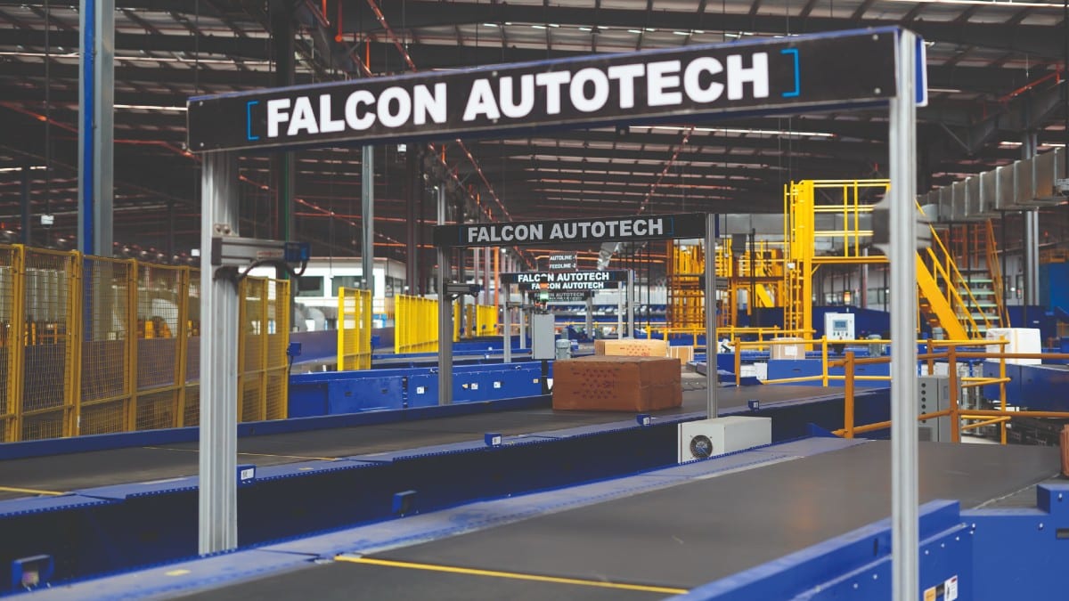 Automated robots in a warehouse managing inventory for e-commerce fulfilment.