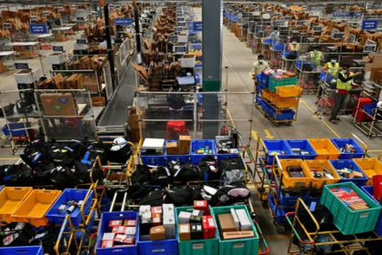 Automated warehouse with robots sorting packages efficiently.