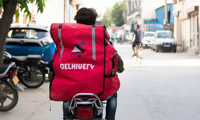 SCM SPECTRUM - Delhivery 2-hour delivery service logo