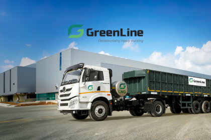 SCM Spectrum - A fleet of GreenLine LNG-powered trucks parked at a logistics hub, promoting sustainable transportation in India.