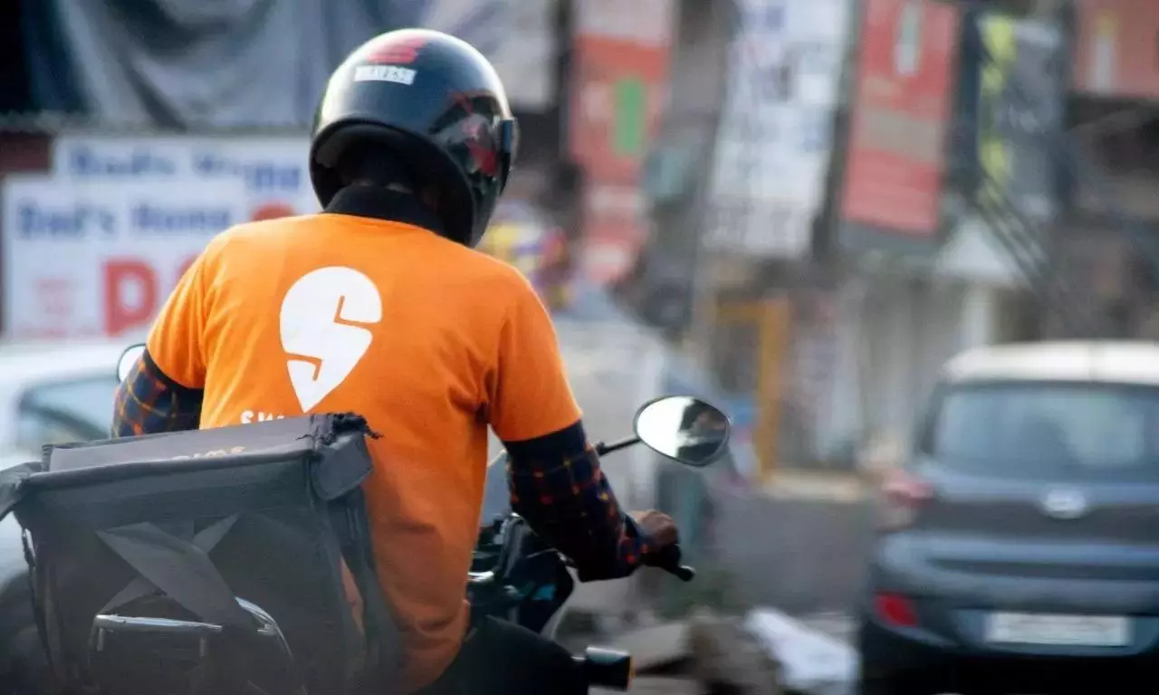 Swiggy reports ₹799 crore loss in Q3 FY2025 with quick commerce growth.