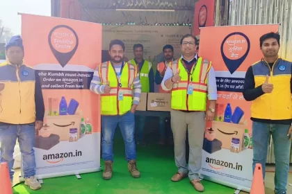 SCM Spectrum - Amazon Suvidha Kiosk at Maha Kumbh 2025 providing order pickups, returns, and essential supplies for pilgrims.