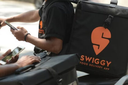 SCM Spectrum - Swiggy delivery riders preparing for orders as the company invests $120M in Scootsy to enhance logistics and supply chain.