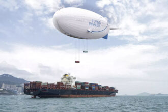 SCM Spectrum - Flying Whales LCA60T airship transporting heavy cargo to a remote location.