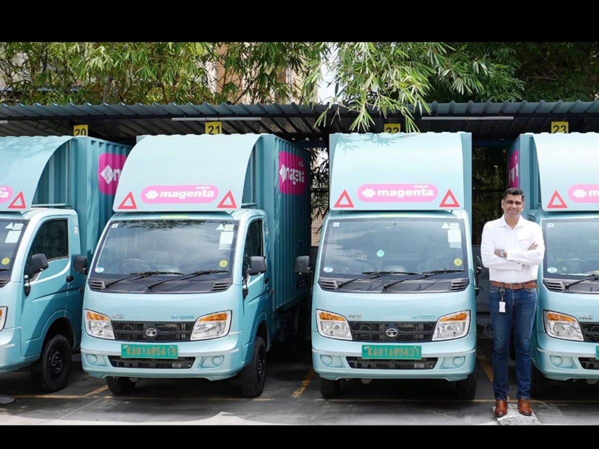 SCM SPECTRUM - Tata Ace EV electric cargo vehicles lined up for last-mile delivery in urban area
