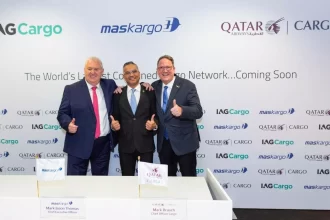 Cargo planes from Qatar Airways Cargo, IAG Cargo, and MASkargo preparing for integrated global operations.