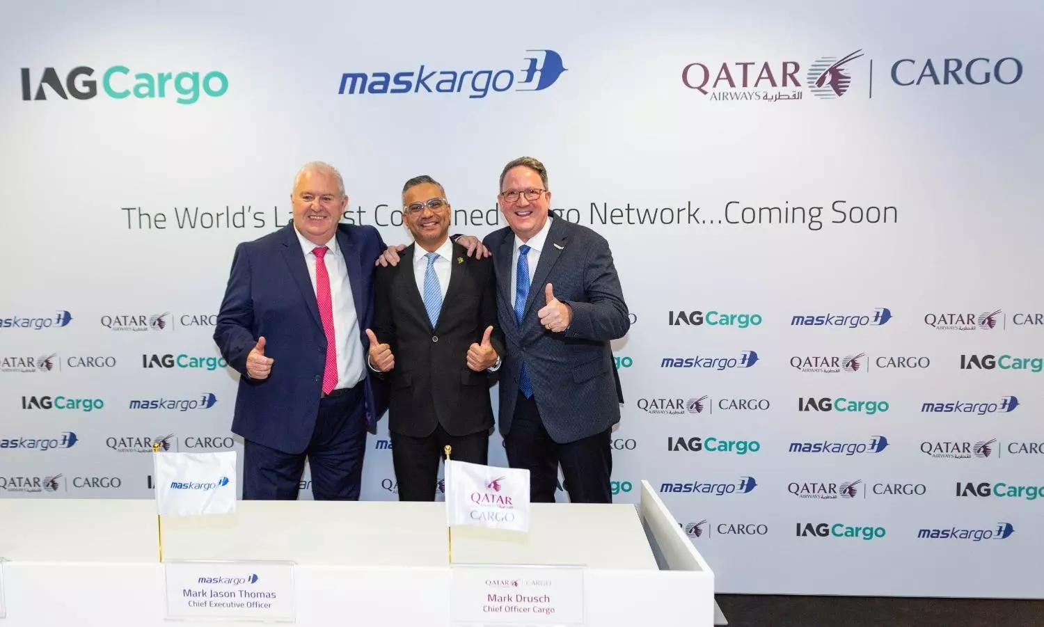 Cargo planes from Qatar Airways Cargo, IAG Cargo, and MASkargo preparing for integrated global operations.