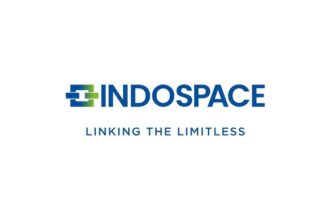 Anshuman Singh, newly appointed MD & CEO of IndoSpace, standing in front of a modern logistics park facility.