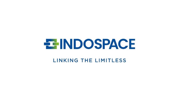 Anshuman Singh, newly appointed MD & CEO of IndoSpace, standing in front of a modern logistics park facility.