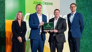 TVS Supply Chain Solutions team celebrating John Deere Partner-level supplier recognition